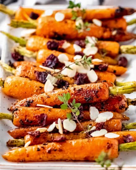 Roasted and caramelized in a maple herb glaze, these carrots are an easy side dish that's perfect for a holiday meal, or a simple family dinner!