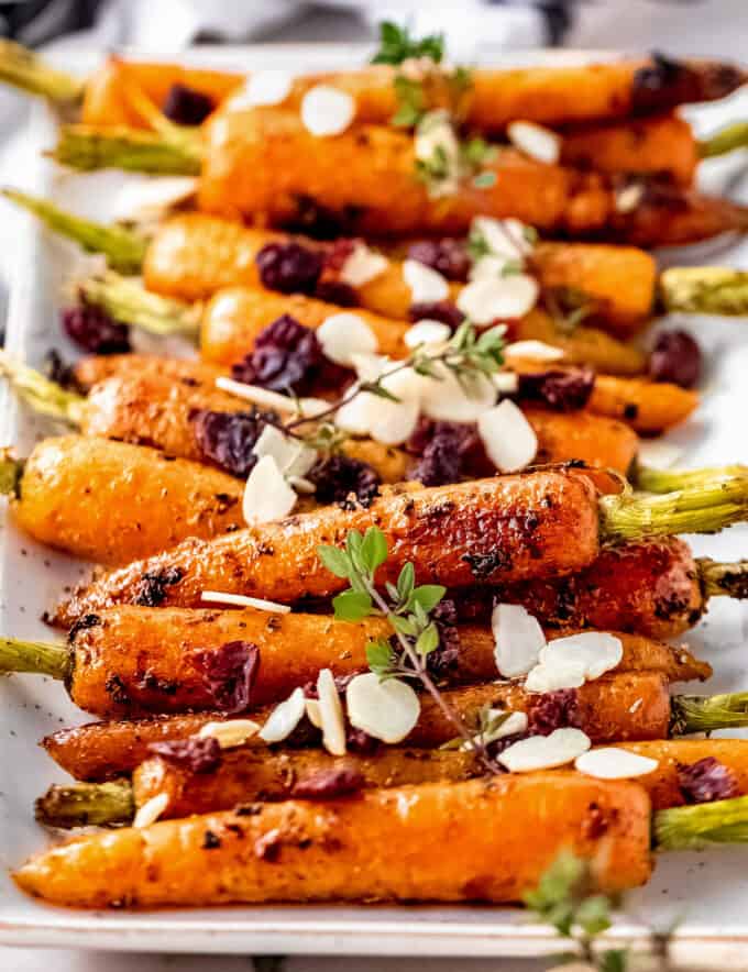 Roasted and caramelized in a maple herb glaze, these carrots are an easy side dish that's perfect for a holiday meal, or a simple family dinner!