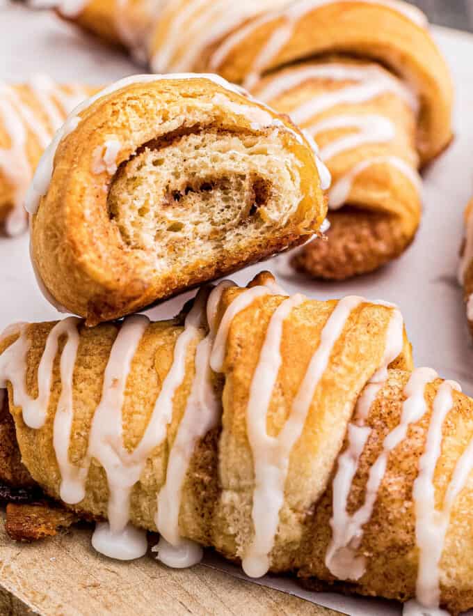 Buttery and flaky crescent roll dough, spread with a cinnamon brown sugar butter, then rolled up and baked until perfectly golden brown and drizzled with a sweet glaze. They're the perfect easy breakfast or brunch idea that comes together in no time, and are loved by everyone!