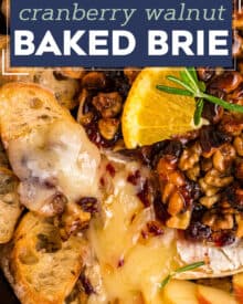 This baked brie recipe is perfect for the holidays, or any party! A wheel of brie is topped with an orange/cranberry spread, crunchy walnuts, and floral honey, then baked until perfectly gooey. Serve with baguette slices, apples, crackers, and more!