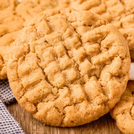 closeup of a classic peanut butter cookie with fork pattern