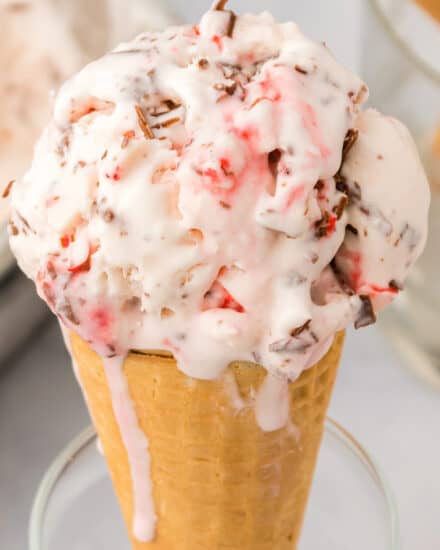 Creamy peppermint infused ice cream is packed with rich shaved chocolate and crunchy bits of peppermint candies. This frozen dessert is so simple to make, and very easy to customize! Plus, no ice cream maker is required!