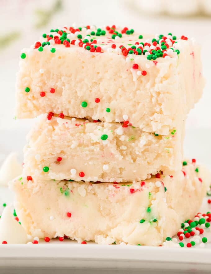 This easy no-bake treat is perfect for the holidays! Made with simple ingredients, this sugar cookie fudge recipe can be customized to any holiday or event, and freezes well for longer storage!