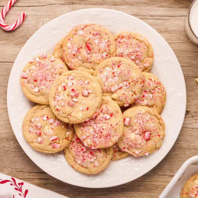 white chocolate peppermint cookies piled on a white plate