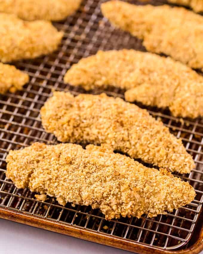 baked chicken tenders on baking sheet