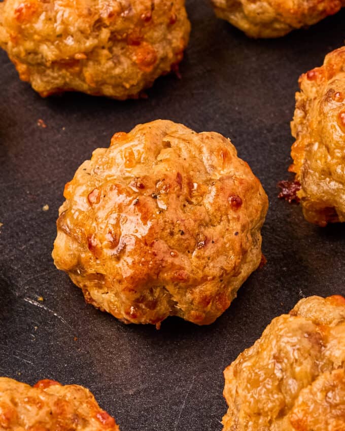 close up of sausage ball on baking sheet