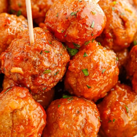 These Honey Buffalo Crockpot Meatballs are slow cooked in a mouthwatering sweet and spicy sauce made from just 4 ingredients! Perfect as a party appetizer, game day treat, or fun dinner!