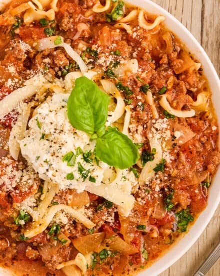 This Lasagna Soup has all the classic lasagna flavors, with none of the layering and extra work. This hearty and easy to make soup is ready quickly, so it's perfect for a busy weeknight dinner! Plus, stovetop, Instant Pot, and slow cooker directions!