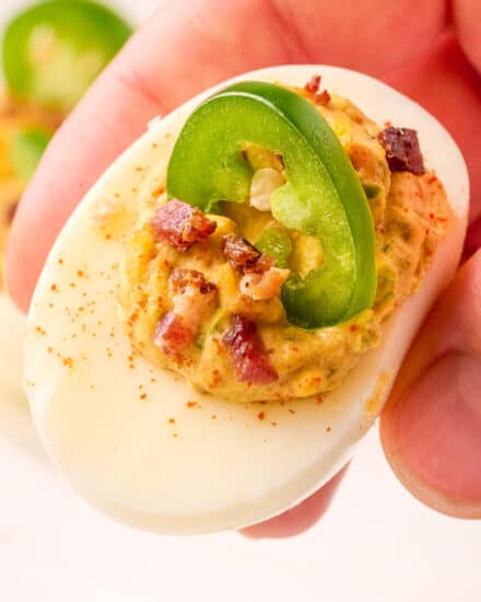 These Jalapeño Bacon Deviled Eggs are so creamy, with a spicy and savory flavor, and easy to make and even prep ahead. Perfect for a bbq, potluck, holidays, and more!