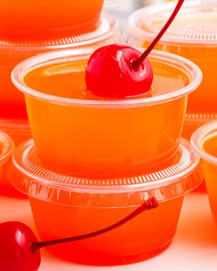 Sweet and fruity, these Tequila Sunrise Jello Shots are a fun way to enjoy a classic summer cocktail... in Jello shot form! Perfect for any summer party, you'll love how easy these are to make, with only 5 ingredients.
