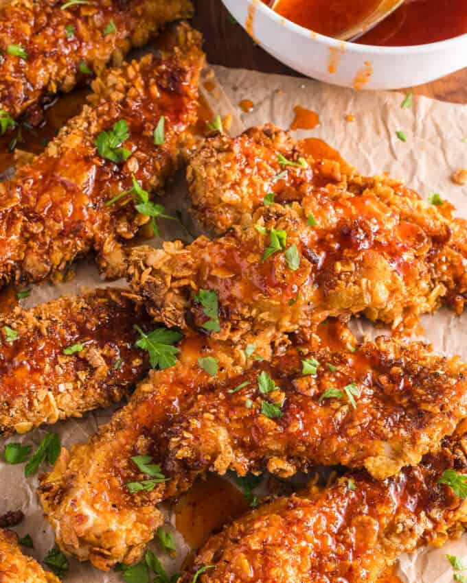 hot honey chicken tenders on parchment