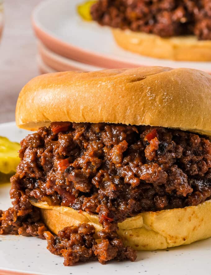 These sweet and tangy homemade sloppy joes are made with simple ingredients, are easy to customize to your tastes, and are made easily in the slow cooker! This easy to make recipe is a family-friendly dinner that you can even make ahead of time and/or freeze. 