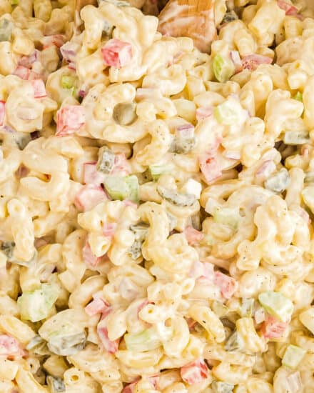 Creamy, tangy, and a little sweet, this macaroni salad is the cold side dish your cookout/potluck needs this summer! It's a great base recipe to tweak until it's just right for you and your tastes!