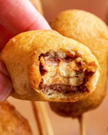 Deep-fried snickers are a classic American fair food, and they're easy to make at home. Just grab 5 simple ingredients, and you'll be on your way to a deliciously gooey treat!