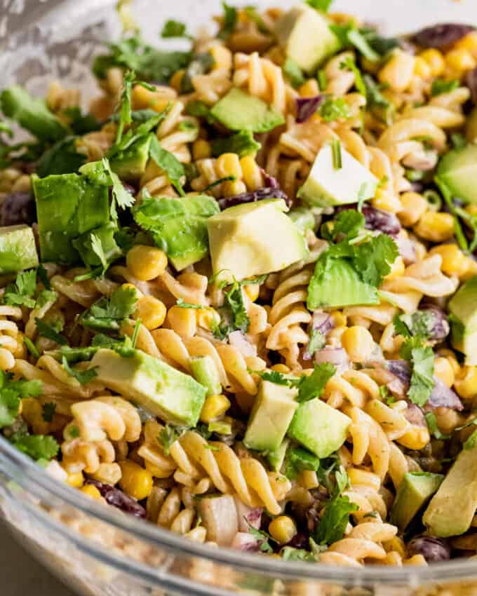 All of the bold flavors of Mexican street corn, but in a delicious chilled pasta salad! Perfect for summer cookouts and potlucks, and super easy to customize to your tastes.