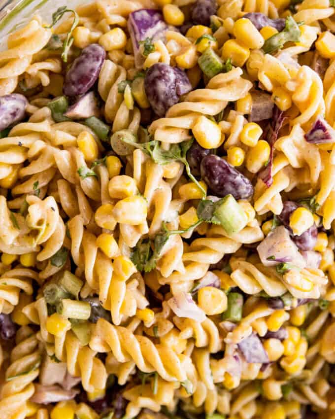 close up photo of summer pasta salad with mexican street corn flavors.