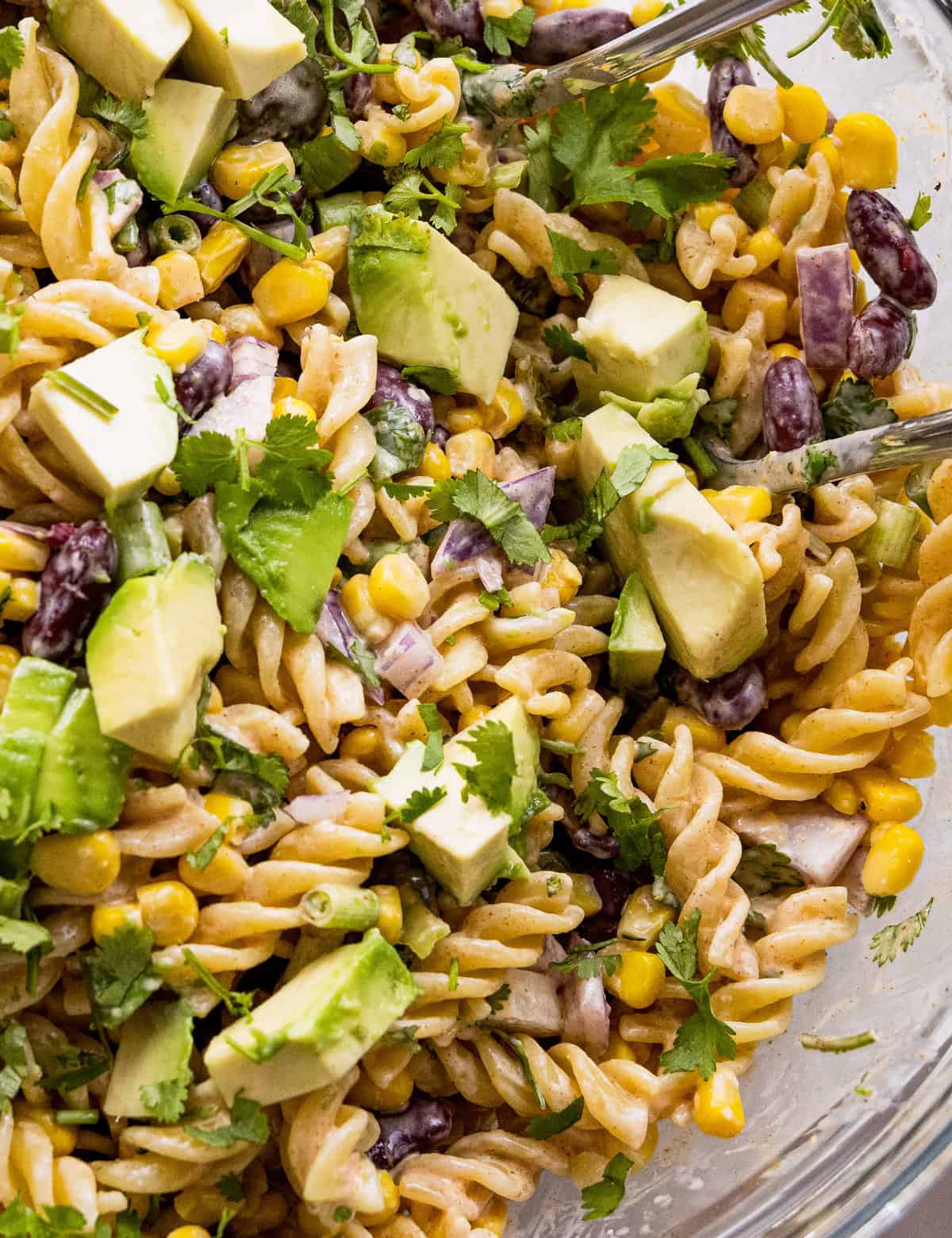 All of the bold flavors of Mexican street corn, but in a delicious chilled pasta salad! Perfect for summer cookouts and potlucks, and super easy to customize to your tastes.