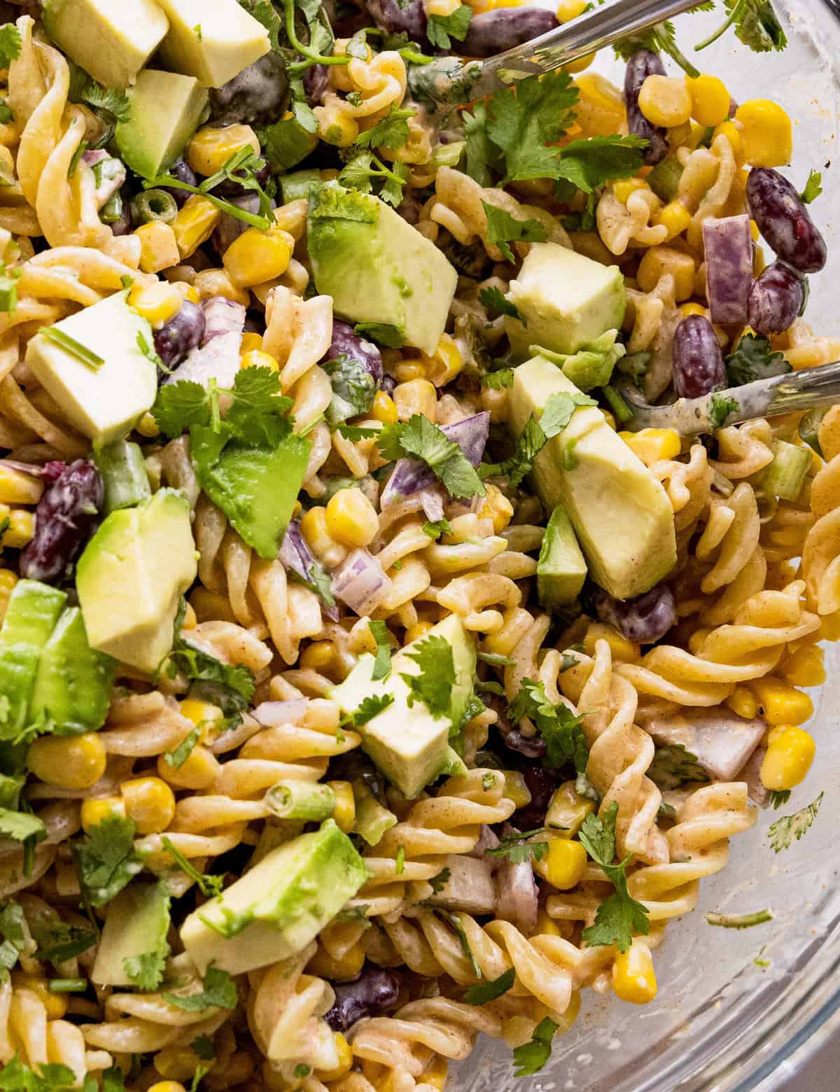 All of the bold flavors of Mexican street corn, but in a delicious chilled pasta salad! Perfect for summer cookouts and potlucks, and super easy to customize to your tastes.