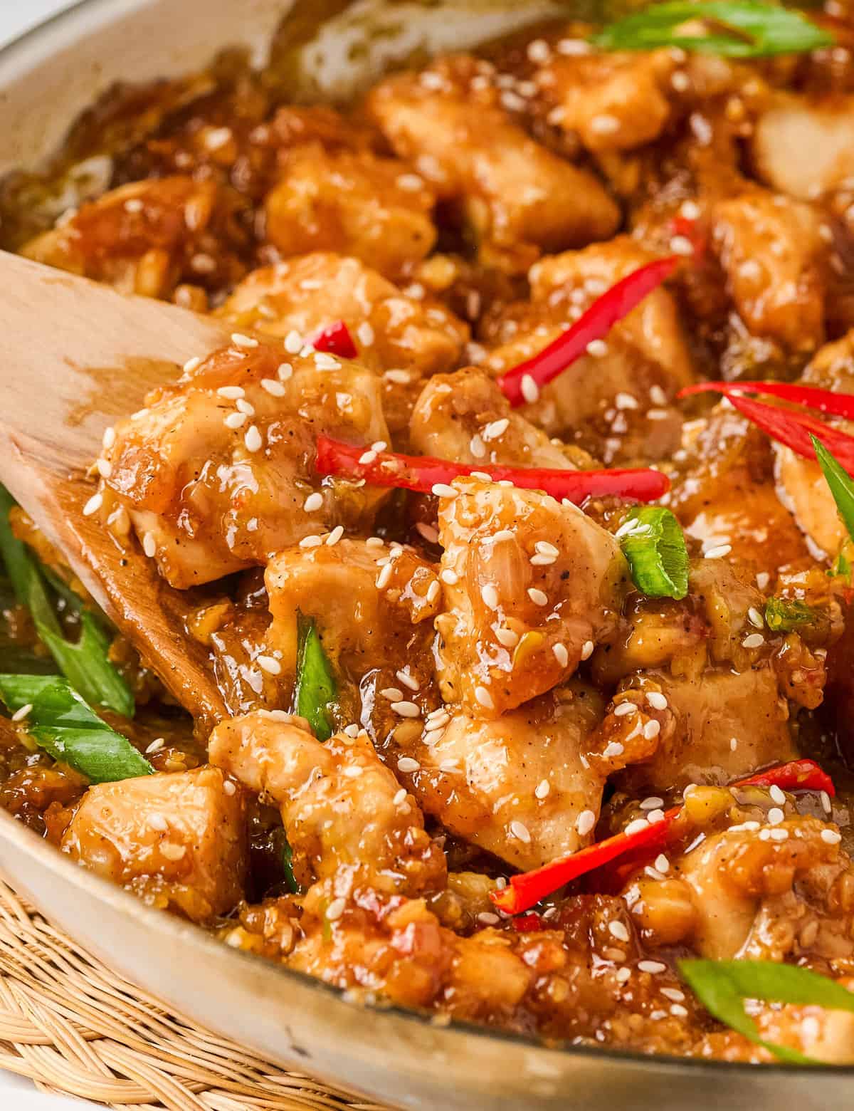 Tender chicken pieces are stir-fried and tossed in a deliciously sticky, savory, and slightly sweet sauce that perfectly coats the chicken! Made in one skillet, and ready in about 30 minutes, it’s the ultimate weeknight dinner idea. Skip the takeout and make your own!