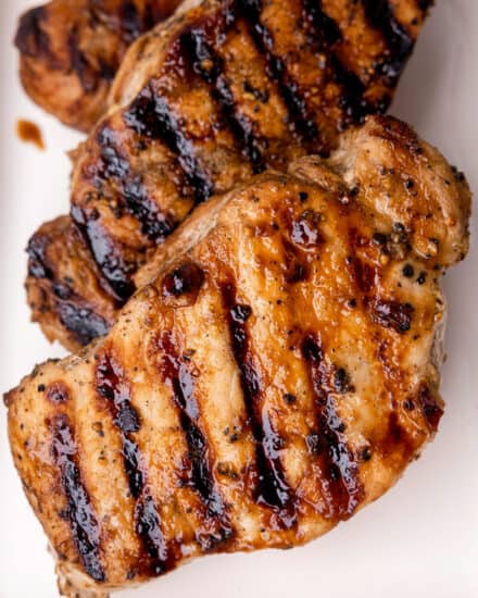 Pork chops are marinated in a simple marinade made with honey mustard, soy sauce, and garlic, then grilled until perfectly juicy and tender with some great char! Perfect for a family dinner, meal prep, and more!