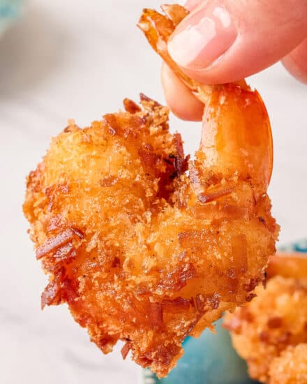 Fried coconut shrimp are made with a crunchy golden brown, slightly sweet coating, fried until perfectly crisp on the outside and juicy inside. Pair them with a spicy and sweet horseradish marmalade sauce and you'll have a mouthwatering tropical seafood dinner or appetizer!