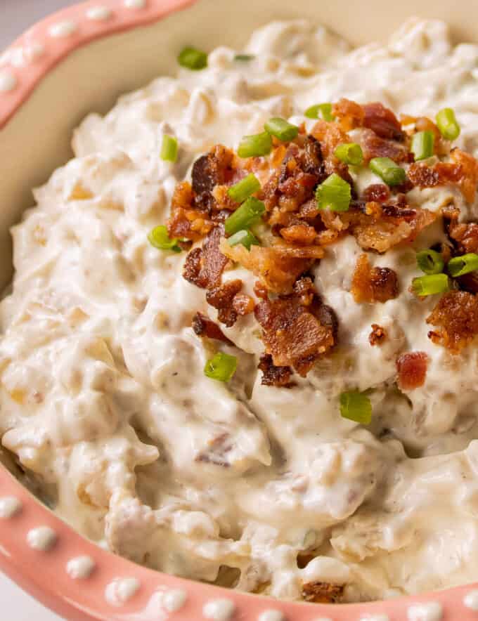 Once you try homemade french onion dip, you'll never want dip made from a packet again! Rich and creamy, with plenty of sweet golden brown caramelized onions and savory bacon pieces. It's the perfect dip for a party, and great to make ahead!