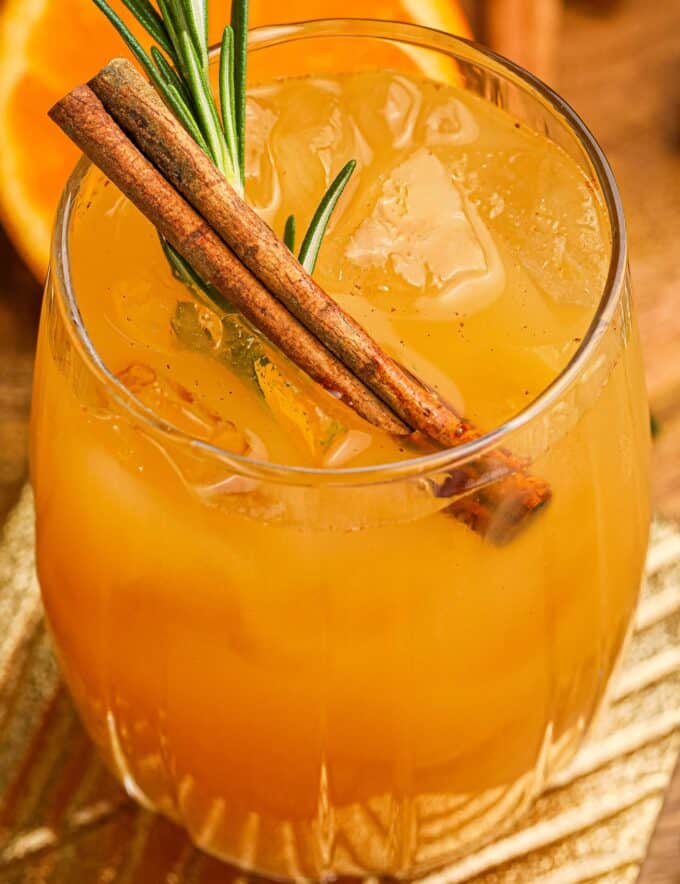 This fall and winter version of the classic whiskey sour uses orange, cinnamon, and maple syrup to bring some warmth to the perfect blend of sweet and sour! It's a great cocktail for autumn and/or the holidays!