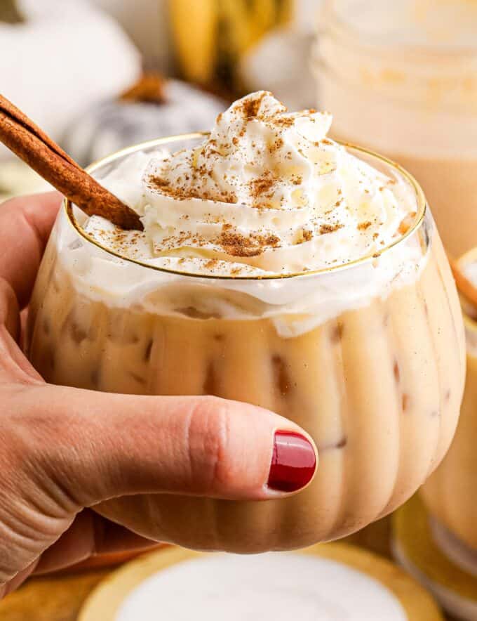 Perfectly spiced and sweetened, this homemade pumpkin spice coffee creamer is made with rich dairy, sweetened condensed milk, pumpkin, vanilla, and warm spices!  Perfect for Fall and Winter, it's the ultimate creamer for hot or iced coffee drinks, and way better than anything from the store!