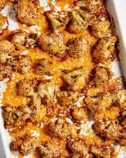 This Parmesan Roasted Cauliflower is the perfect side dish that pairs well with just about any protein! The spiced florets are tender with perfectly caramelized edges, and blanketed in crisp and savory melted Parmesan cheese, and the whole thing is ready in about 30 minutes.