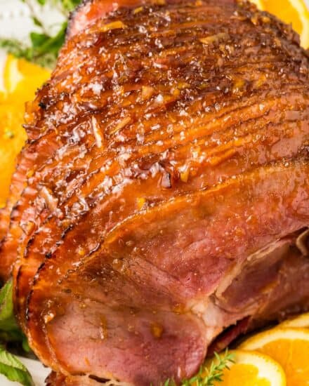 This holiday season, make the most delicious brown sugar orange glazed spiral ham. It only takes about 5 minutes to prep, and the simple 5 ingredient glaze is absolutely mouthwatering! It's all cooked until tender and juicy, then basted until perfectly sticky and caramelized!