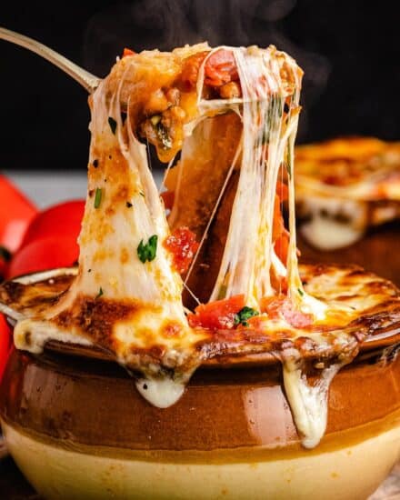 This Deluxe Pizza Soup is brimming with all the flavors of a classic and cheesy deluxe or supreme pizza, but in comforting soup form! Perfect for a weeknight meal, it can be served as a regular soup, or topped with crostini and cheese and baked until gooey and melted (like French onion soup).