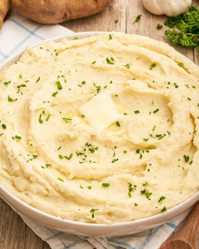 This recipe for cream cheese mashed potatoes is the only one you'll need!  So creamy, buttery, and rich... and they're great as a holiday side dish for Thanksgiving, or alongside a roast, steak, or juicy piece of chicken!