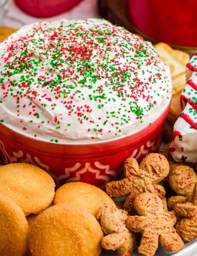 This simple 5 ingredient (plus optional garnishes) Christmas Tree Cake Dip is perfect for any holiday gathering or party. Made with delicious Little Debbie Christmas tree cakes, this dip doesn't require any chilling, and has two different versions so you can make the one you love most!