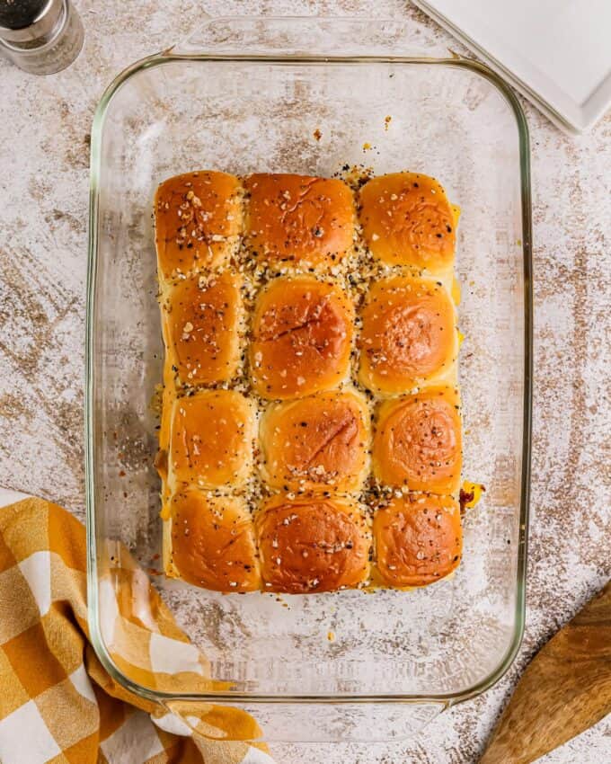 breakfast sliders in glass baking dish.