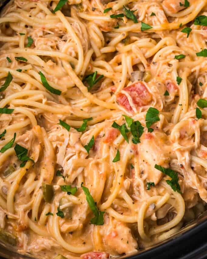 creamy chicken spaghetti in slow cooker.