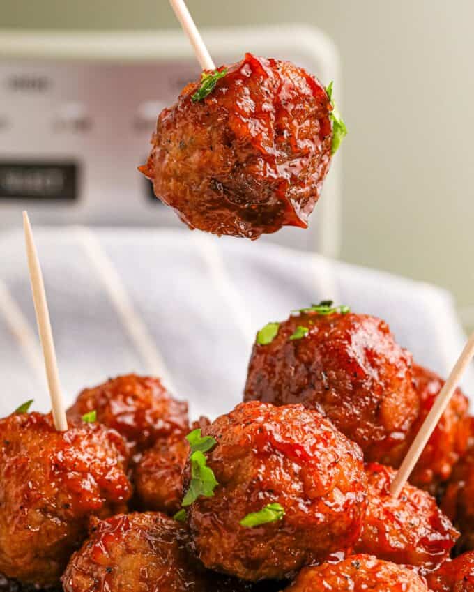 crockpot meatballs speared with toothpicks.