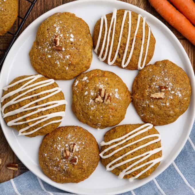 round plate filled with seven carrot cake cookies
