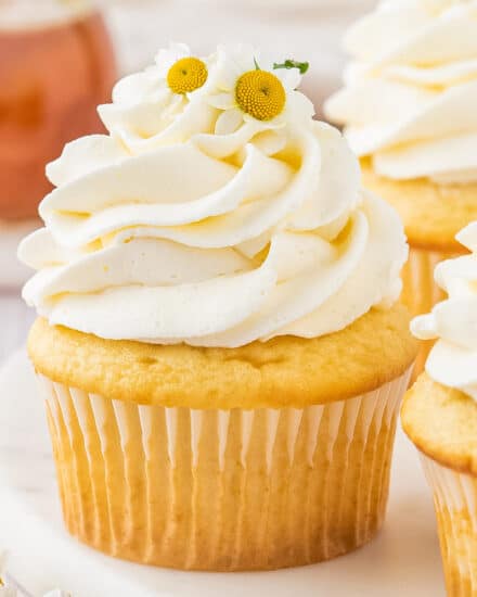 These chamomile cupcakes are the perfect blend of fluffy, soft, and moist. Topped with a generous swirl of honey buttercream frosting, they taste like a sweet cup of chamomile tea, and are perfect for Spring and/or Easter!