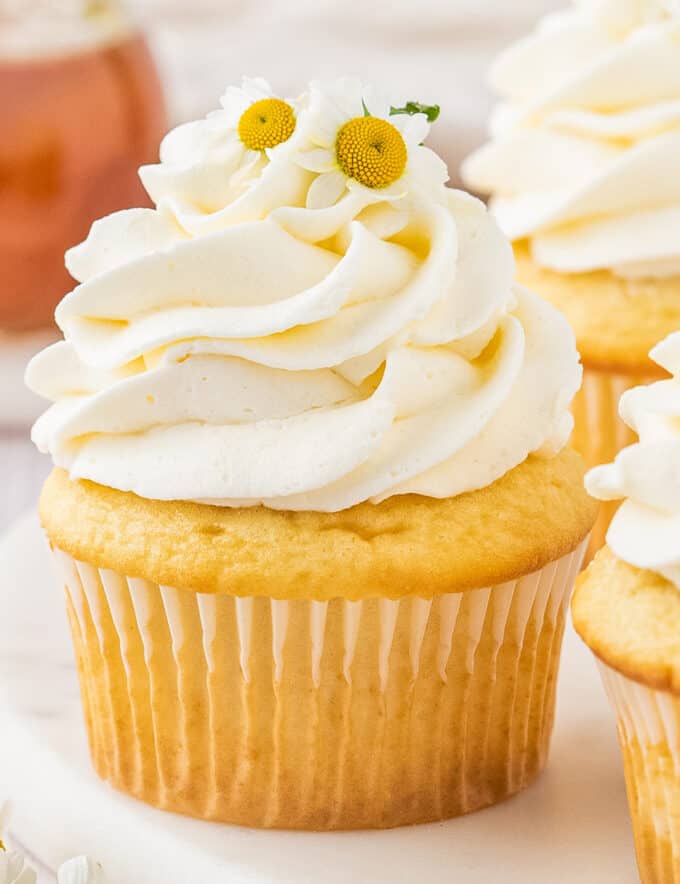 These chamomile cupcakes are the perfect blend of fluffy, soft, and moist. Topped with a generous swirl of honey buttercream frosting, they taste like a sweet cup of chamomile tea, and are perfect for Spring and/or Easter!
