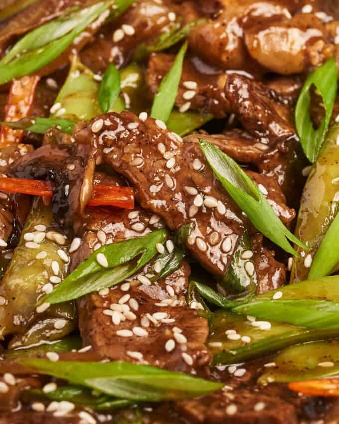 This black pepper beef stir fry is made with tender pieces of steak that are tossed in a deliciously sticky, savory, and slightly sweet sauce that perfectly coats the beef and veggies! Made in one skillet, and ready in about 30-40 minutes, it’s the ultimate weeknight dinner idea. Skip the takeout and make your own!