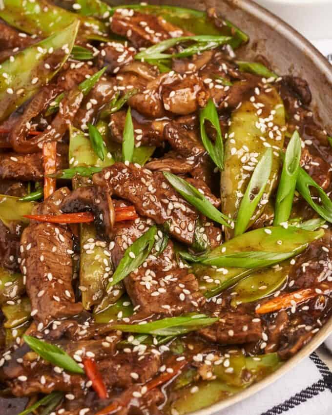 beef stir fry in stainless steel skillet.