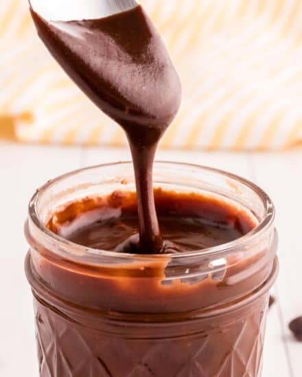 Rich and silky hot fudge sauce made easily on your stovetop, using real, everyday ingredients! This simple recipe is perfect drizzled all over your favorite desserts, given away as gifts, or eaten by the spoonful!