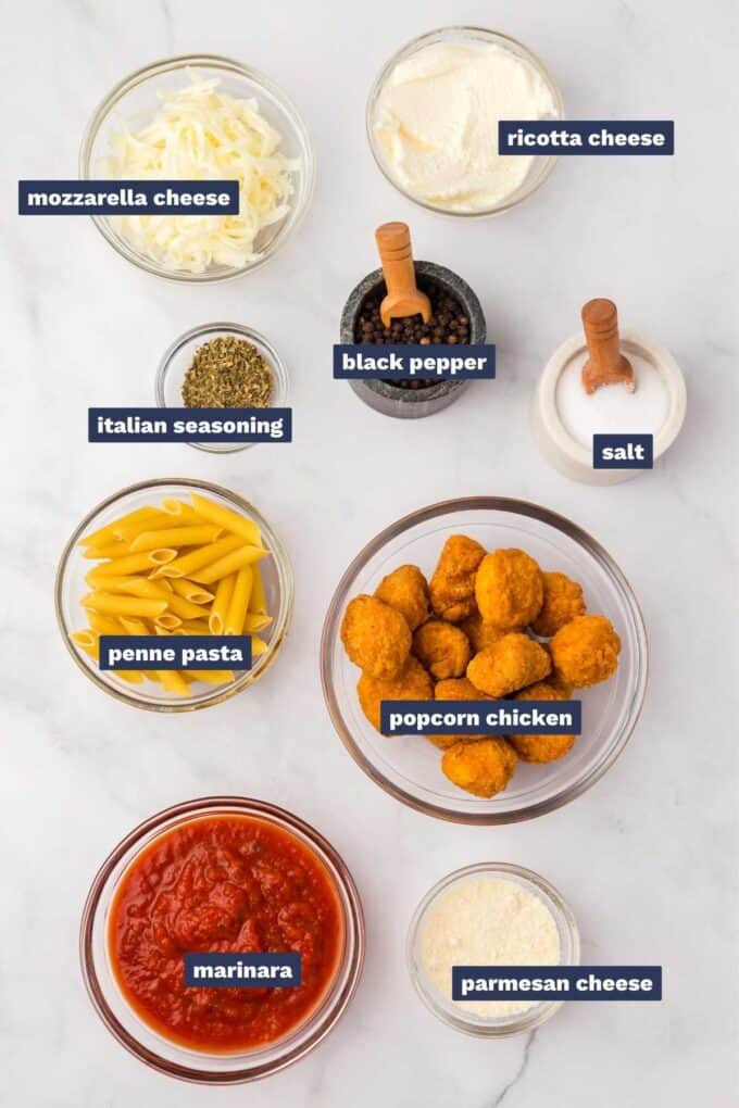 Ingredients needed to make chicken parmesan casserole.