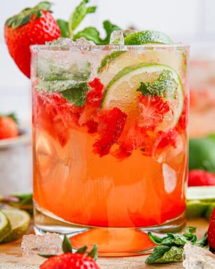 These sweet strawberry mojitos are a summery twist on a classic mojito cocktail, and are perfect for all your warm-weather gatherings! This recipe includes both small and large batch instructions.