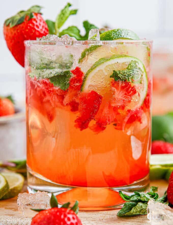 These sweet strawberry mojitos are a summery twist on a classic mojito cocktail, and are perfect for all your warm-weather gatherings! This recipe includes both small and large batch instructions.