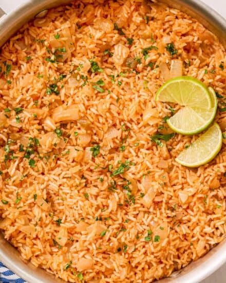 Soft and fluffy rice, loaded with flavor, made with just 5 simple ingredients, and cooked easily on the stovetop. Perfect for your Cinco de Mayo celebration, Taco Tuesday, or any Tex-Mex style recipe!