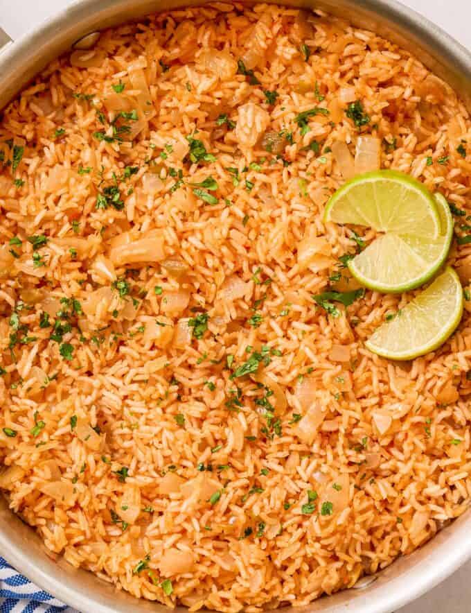 Soft and fluffy rice, loaded with flavor, made with just 5 simple ingredients, and cooked easily on the stovetop. Perfect for your Cinco de Mayo celebration, Taco Tuesday, or any Tex-Mex style recipe!