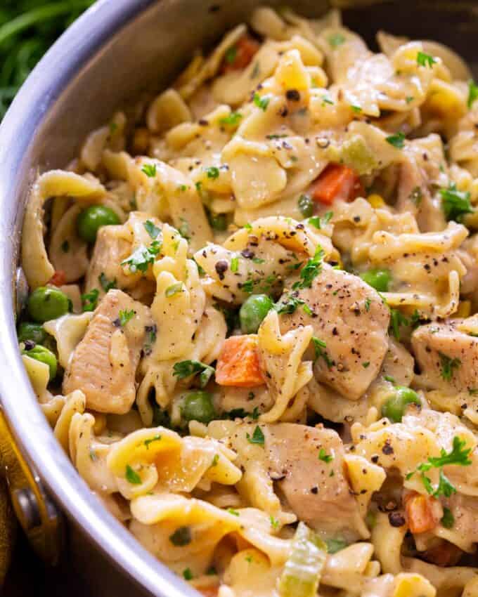 creamy chicken pasta in skillet