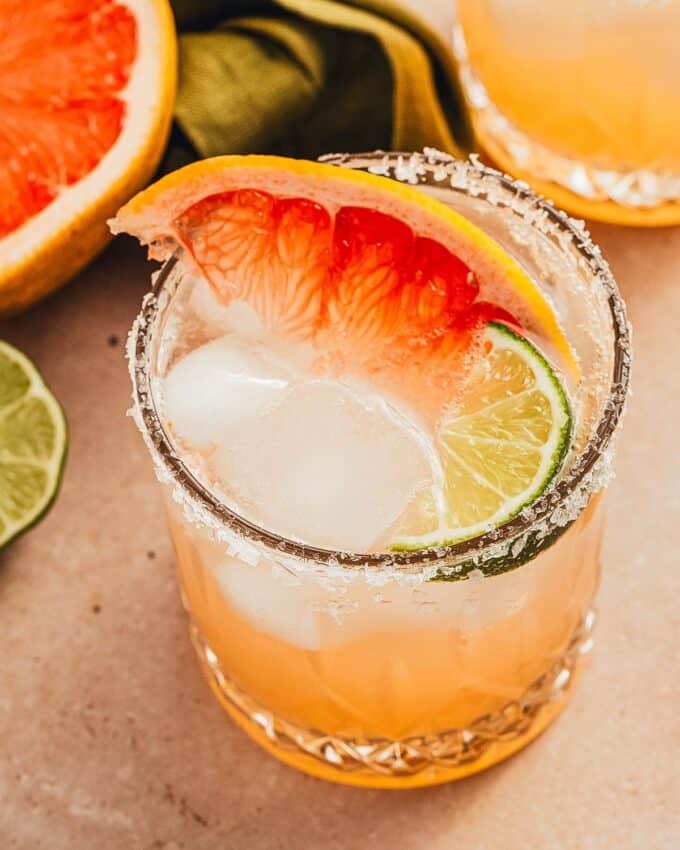 close photo of a paloma with a salted rim.