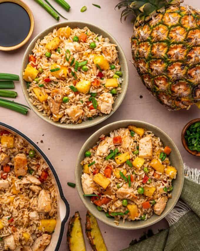 bowl of fried rice with chicken and pineapple